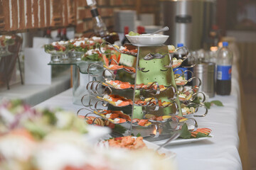 Beautifully decorated wedding table and other details at wedding hall. Wedding day.