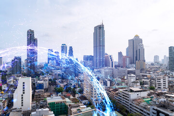 Fototapeta premium Abstract technology icons hologram over panorama city view of Bangkok, Asia. The concept of people networking and connections. Double exposure.