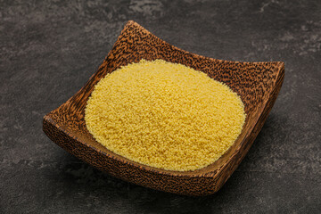 Raw cous cous heap in the bowl
