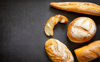 Assorted loaves homemade artisan bread. With copy space and space for text, banner