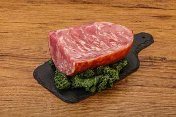 Beef ham piece over board