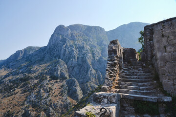 Old stone stairs to the ruins of ancient Kotor fortress in Lovcen mountains of Montenegro