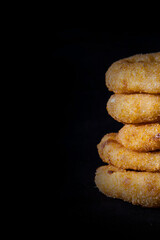Close up on a stack of onion rings