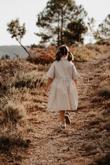 girl walking in the woods