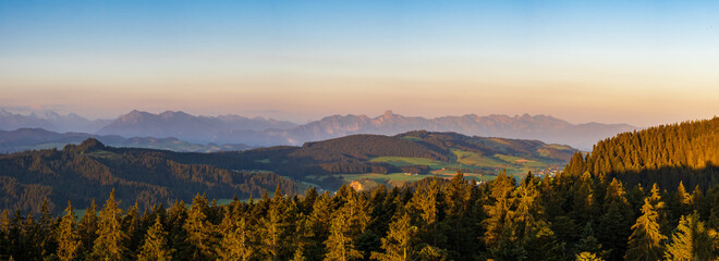 Panoramic view over the alps and hills of the emmental valley