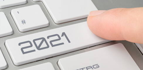 A keyboard with a labeled button - 2021
