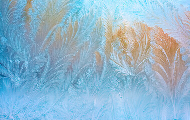 Colorful frosty pattern on the window