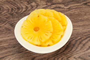 Marinated pineapple rings in the bowl