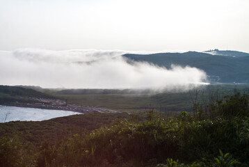 Fog over the Russian island bay