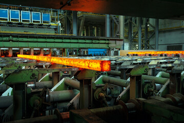 Steel production in electric furnaces. Sparks of molten steel. Electric arc furnace shop . Metallurgical production, heavy industry, engineering, steelmaking