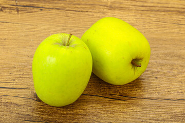 Two ripe green sweet apples