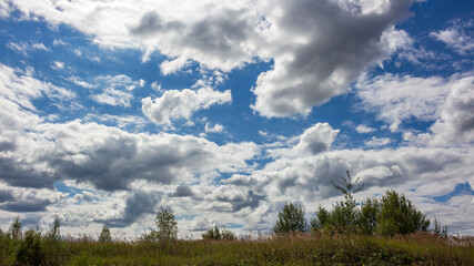 Obraz premium Panoramic view of blue sky with Cumulus clouds 