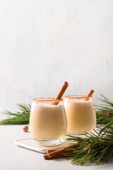 Traditional Christmas eggnog with grated nutmeg and cinnamon. Close up.
