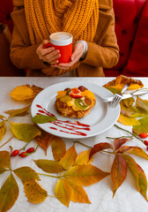Autumn leaves cup coffee thanksgiving fruit woman hands hold cake red yellow