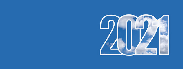 Happy new year 2021. The 2021 numbers with the white cloud texture are superimposed on each other. Isolated blue background, copyspace, banner. The concept of the new year holiday.