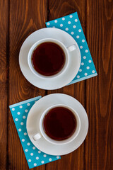 Fototapeta na wymiar Tea cups on a wooden table. Cafe, restaurant, food, breakfast.
