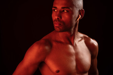 Fototapeta premium Close-up photo of serious afro american sports man