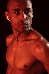 Fototapeta premium Close-up photo of serious afro american sports man