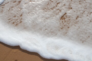 waves on the sand in a desert  beach