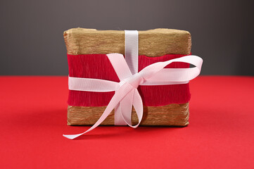 Gift wrapping on a red background