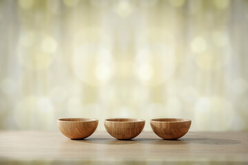 Wooden Christmas table in the kitchen with attributes for cooking dishes on a magical evening