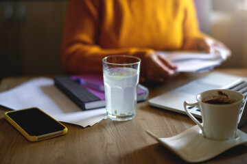 Close up of woman managing home utility bills