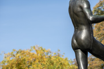 Fototapeta na wymiar David and Goliath sculpture placed in Parc des Bastions in Geneva