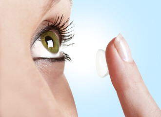 Woman Using Contact Lenses