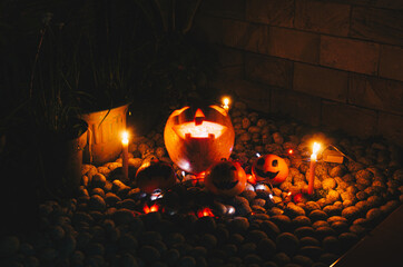 Halloween Jack-o-Lantern Pumpkins on stone stock photo