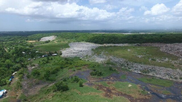 Aerial forward view of Duquesa landfill at Santo Domingo. Dominican republic