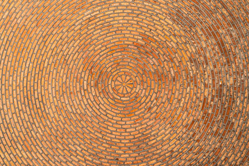 Red brick vault. Ceiling. Circular pattern. Architectural texture