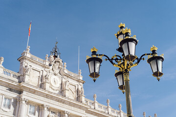 Fototapeta na wymiar Royal Palace in Madrid in a beautiful blue sky day, Spain