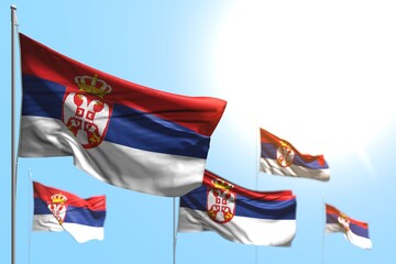 wonderful 5 flags of Serbia are wave against blue sky picture with bokeh - any holiday flag 3d illustration..