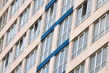 new windows on the facade of a high-rise building