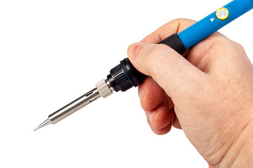 Soldering iron in hand with the blue handle.