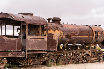 Old rusty locomotive abandoned in a train cemetery. Uyuni, Bolivia
