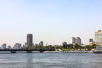 Fototapeta na wymiar Egypt, Cairo - 05/05/2015: Walk around the city in the afternoon. Buildings and the Nile River.