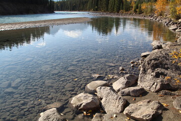 Fototapeta na wymiar Reflections On The Athabasca River, Jasper National Park, Alberta