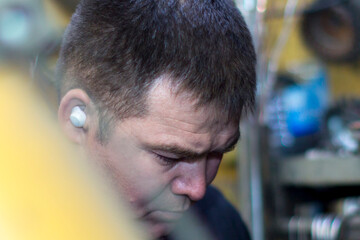 Close-up portrait of a man in the workplace