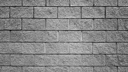 Grey color brick wall texture.