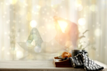 Christmas breakfast on the table and the morning luminous in the background