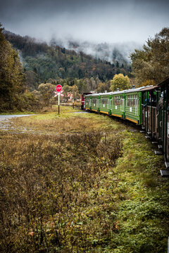 Retro Train Journey Trough Bieszczady Mountains in Poland. Autum Season. Moody and Toned Image