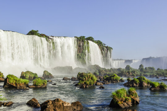 The stunning Iguazu Falls in a beautiful day with blue sky. Foz do Igua&ccedil;u, Brazil.