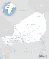 Blue-gray detailed map of Niger administrative divisions and location on the globe.