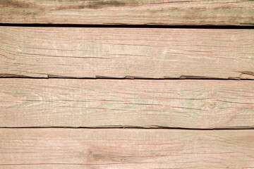 Fototapeta premium Old wooden planks.Boards with cracked relief and paint residue.