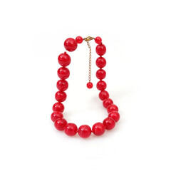 Red round beads isolated on white background
