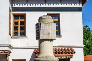 Old Russian stone road sign, so called 'Ekaterine mile' near Khan palace in Bakhchisaray, Crimea. Writing translates as 'Empress Catherine deigned to be in blessed memory in Bakhchisarai in May 1787'