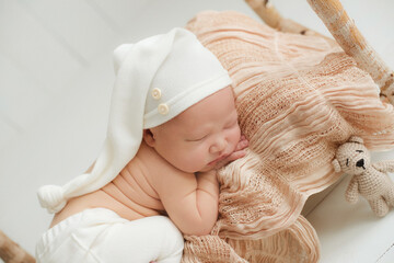 portrait of a little infant newborn baby: baby's face close-up. concept of childhood, healthcare,...