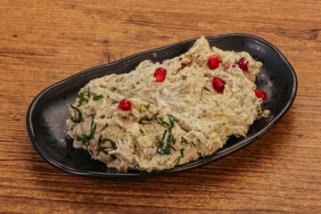 Vagan dietary cusine - mutabal with granet seeds