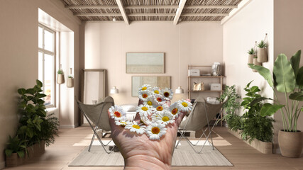 Woman's hand holding daisies, spring and flowers idea, over country rustic wooden bedroom with diy pallet bed, duvet and pillows, carpet and armchair, window, interior design concept